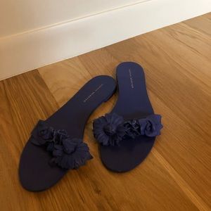 Sophia Webster cobalt flower slides.